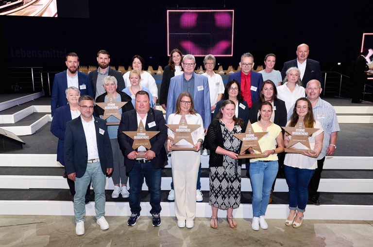 Siegerfoto mit den Gewinnern Sterne-Bedientheke